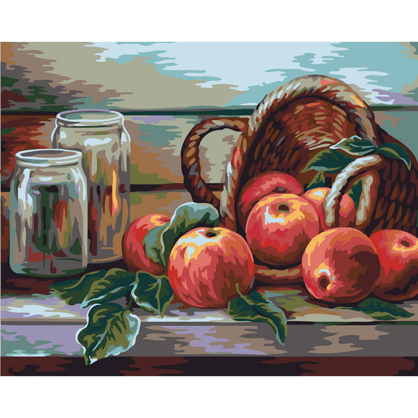 Basket of red apples and jars