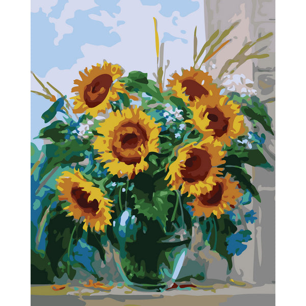 Transparent vase and sunflowers
