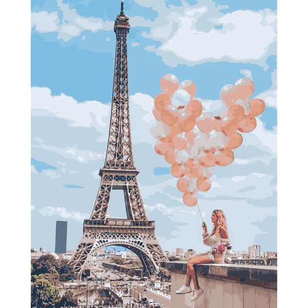 Woman and balloons by the Eiffel Tower