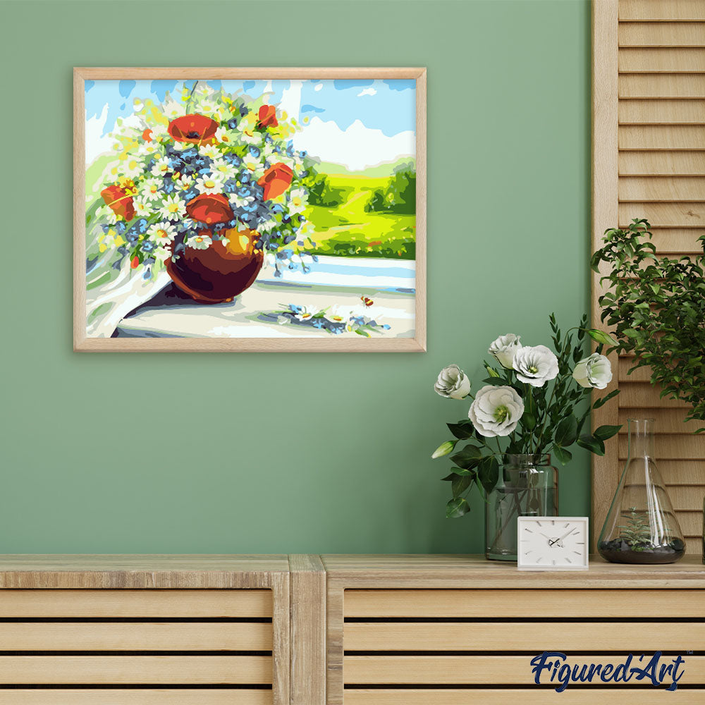 Vase of flowers with a view of the fields