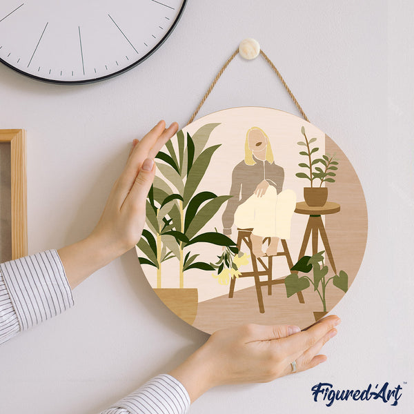 Paint by numbers on Wood Slice - Woman in the room with plants